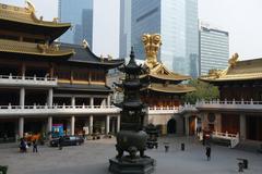Jing'an Temple in Shanghai China with traditional architecture and bustling street