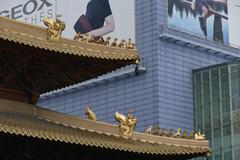 Jing'an Temple in Shanghai, China showcasing traditional Chinese architecture and bustling urban surroundings