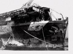 Damaged bow of the Hornet CV-12 aircraft carrier being repaired after June 1945 typhoon at Hunters Point San Francisco July 1945
