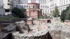 Saint George Rotunda in Sofia with Roman ruins in front and Balkan Hotel in background