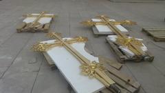 Crosses ready for installation on the dome of Holy Transfiguration Cathedral in Armenian Monastery Complex, Moscow