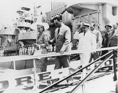President Juan Peron, Senora Eva Peron, Rear Admiral Fidel W. Anadon, and Dr. Juan A Branueglia leaving USS Albany at Buenos Aires in 1948