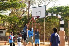 Manipal students playing basketball outdoors