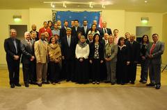 U.S. Secretary of State John Kerry posing with U.S. Embassy Cairo staff