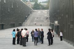 Jin Wang Kim and faculty visiting Ewha Women's University ECC guided by his daughter