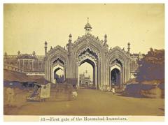 Entrance gate of Hoosainabad Imambara with large archway and sphinx statues in Lucknow