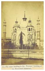 Stone building leading to the principal building of Hooseinabad Imambara in Lucknow with grand architecture and sphinx statues