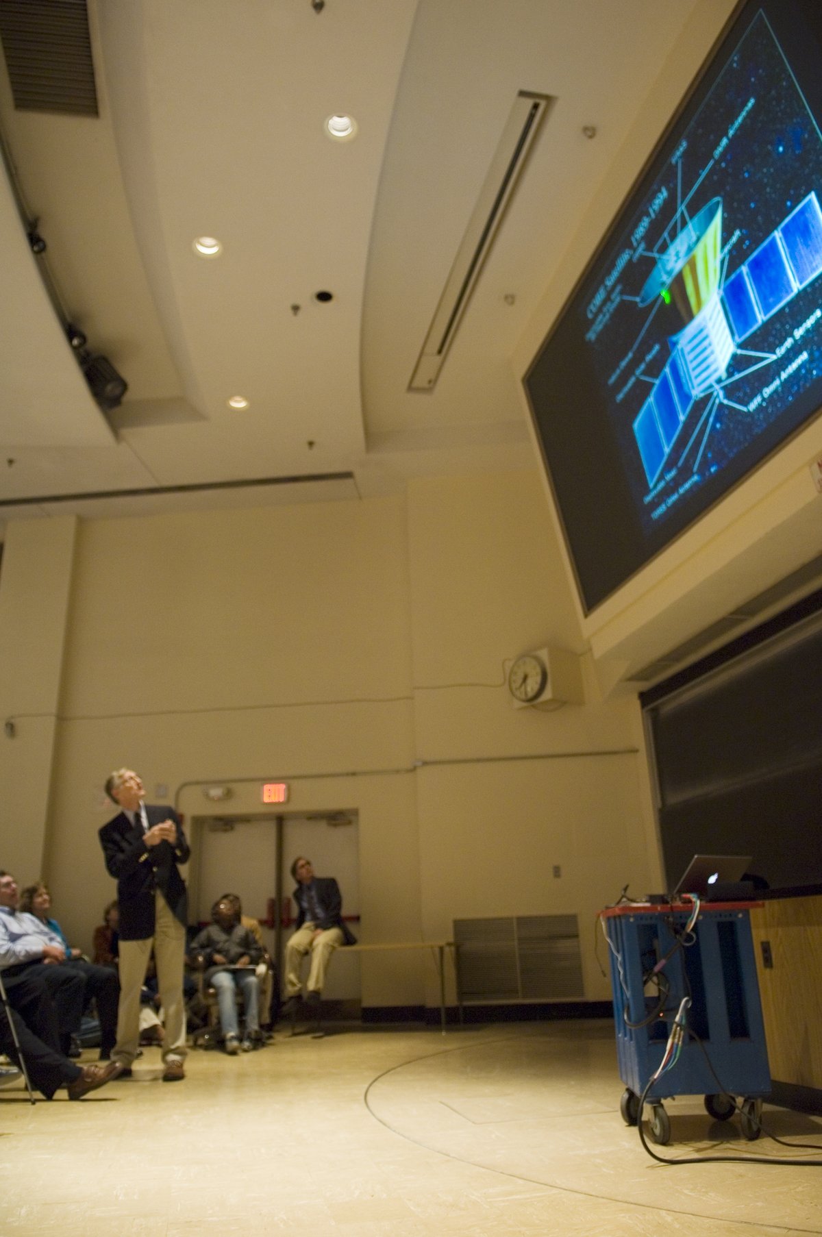 Dr. John Mather speaking at University of Maryland auditorium about COBE work that won Nobel Prize for Physics