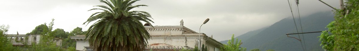 Gagra railway station with a platform and a few waiting passengers
