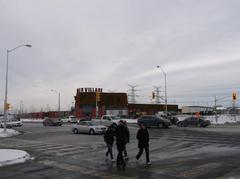 Bus bays at TTC's Pioneer Village Station on opening day with buses and passengers