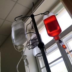 Infusion flasks containing components of R-CHOP chemotherapy regimen with deep red doxorubicin