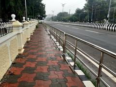 Newly laid sidewalk near Manimandapam in Thanjavur Tamil Nadu India on a rainy day