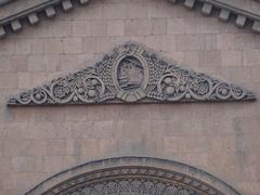 Architectural details of Yerevan Railway Station facade with ornate brickwork in Armenia