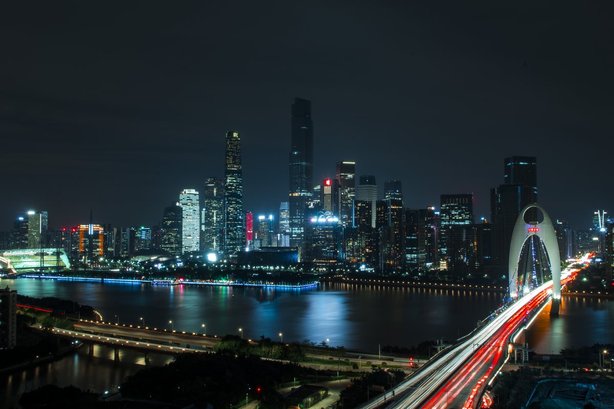 Guangzhou city skyline at night illuminated with lights
