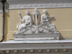 Philosophy and medicine relief sculptures on the facade of the National Library of Finland