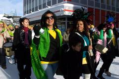 Samba parade in winter with dancers in vibrant costumes in Tromsø