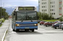 Tromsbus passing by Myrengblokkene residential buildings in Tromsø city