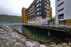 Neighborhood at Hjalmar Johansens gate in Tromsø with residential buildings and street view