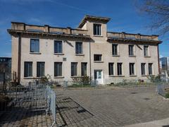 Façade of Tony Garnier Hall building in Lyon 7th district from the northeast