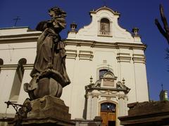 Bell tower and sculptures of the front staircase of St. Anthony's Church in Lviv