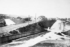 Historical view of Vilnia Rudnickaje Pradmiescie with railway and St. Stephen church monastery