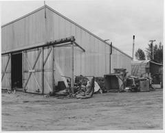 Airplane hangar at Lake Hood in Anchorage with seaplanes and snowy surroundings