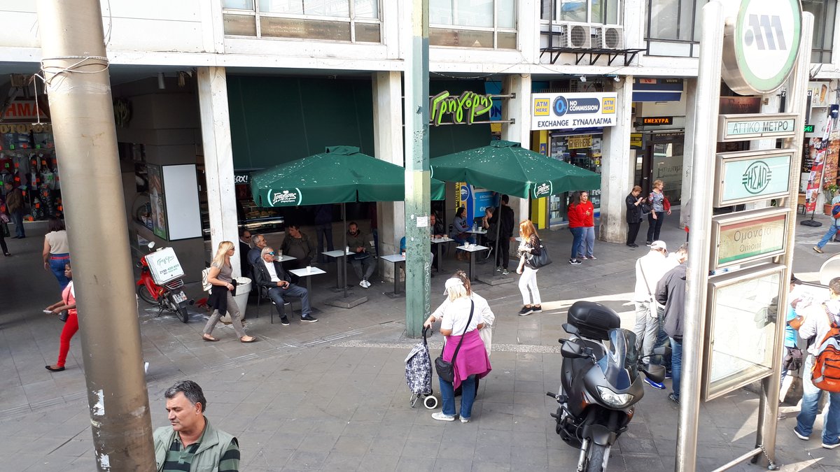 Omonia Square in Athens with busy street and buildings in autumn 2018