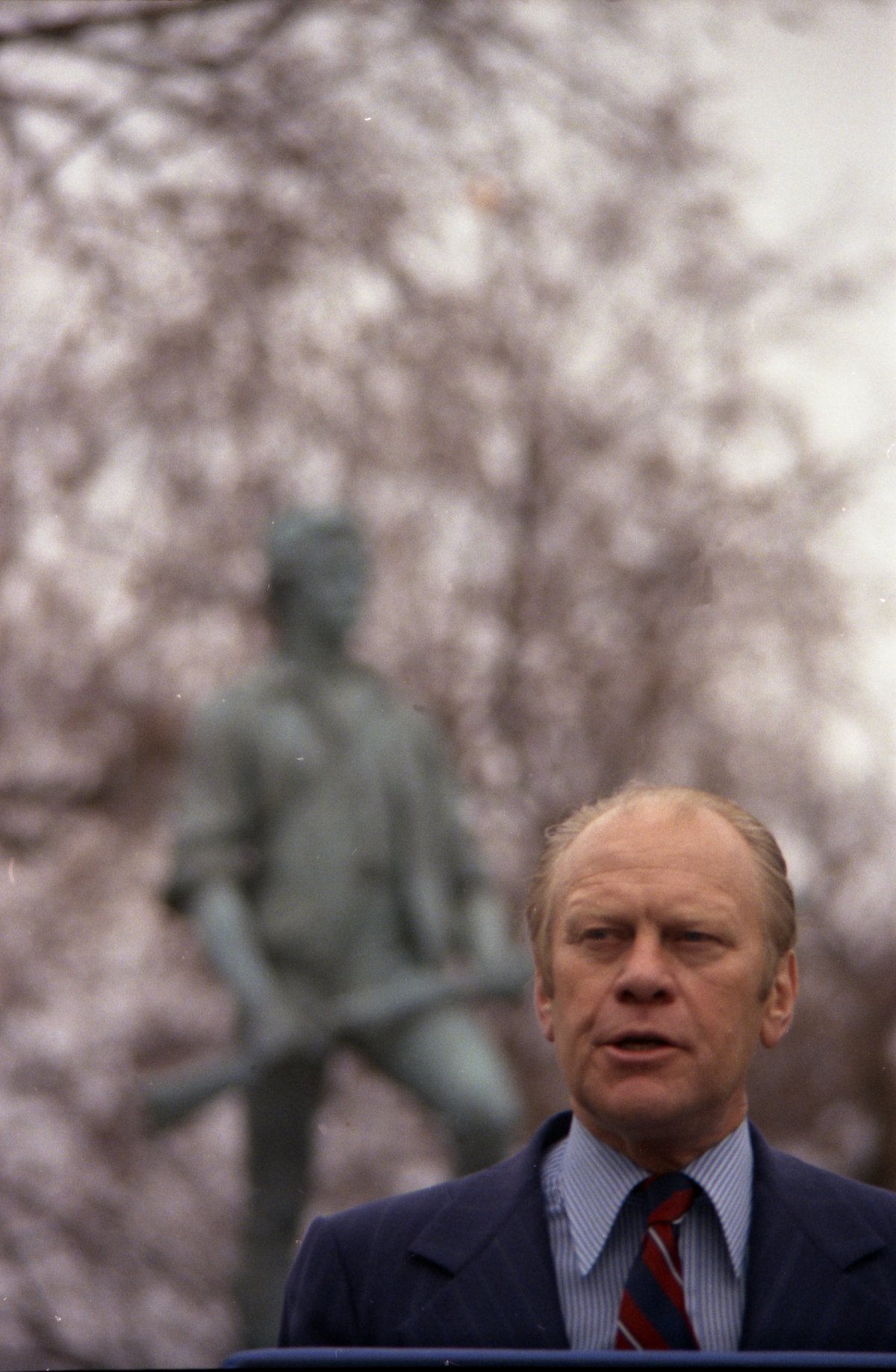 President Gerald R. Ford delivering remarks at Bicentennial Ceremony in front of Minuteman Statue Lexington Green