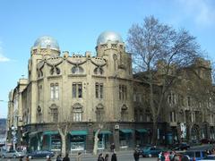Rustaveli Avenue, bustling main street in Tbilisi, Georgia with historic buildings and clear sky