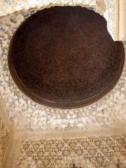 Palacio de los Leones in Alhambra, Granada showcasing the famous lion fountain and intricate Islamic architecture