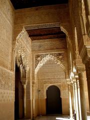 Palacio de los Leones at Alhambra in Granada Spain with lion fountain and intricate columns