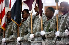 Color guards participating in a transfer of authority ceremony at Camp Victory's Al Faw Palace on Aug. 15