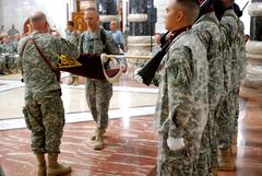 Maj. Gen. Ronald D. Silverman and Command Sgt. Maj. Roger Schulz casing unit colors at transfer of authority ceremony