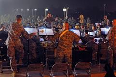 Chief Warrant Officer John Fraser conducting Multi-National Corps-Iraq band during Fourth of July performance at Al Faw Palace, Camp Victory, Baghdad
