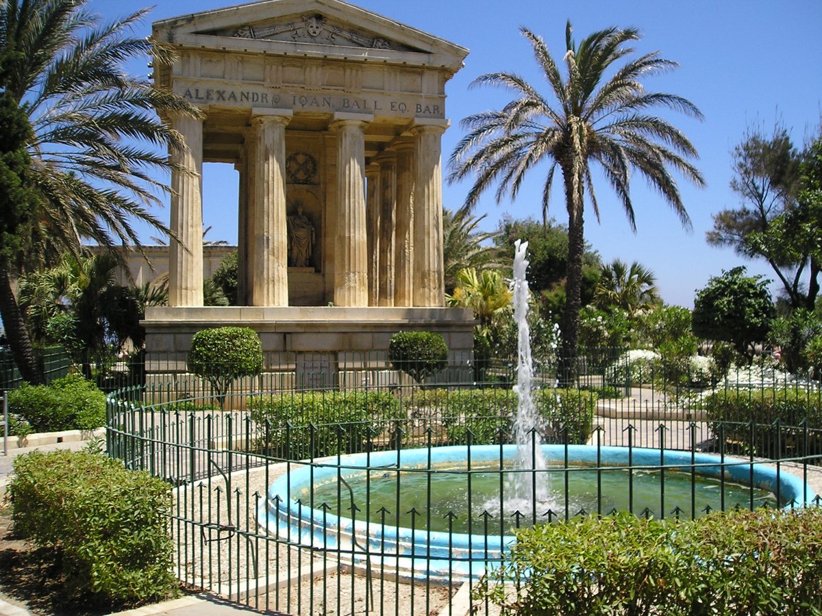 View of Lower Barracca Gardens in Valletta with lush greenery and historic cityscape