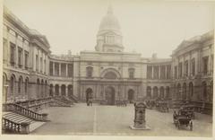 Courtyard of the Old University of Edinburgh with historic university buildings and horse-drawn carriages in Edinburgh, circa 1870-1890