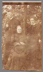 Black and white photograph of three women, Caesar Gezelle, Philomena De Smet, and Elisa Lateur