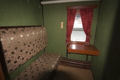 Interior of a vintage train carriage at the Historical Exhibition of Railway Rolling Stock in Kyiv