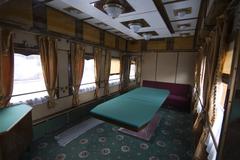 Interior of a historical train carriage exhibiting railway rolling stock in Kyiv