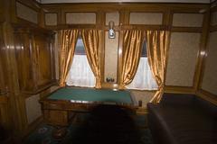Interior of a historical train carriage at a railway exhibition in Kyiv