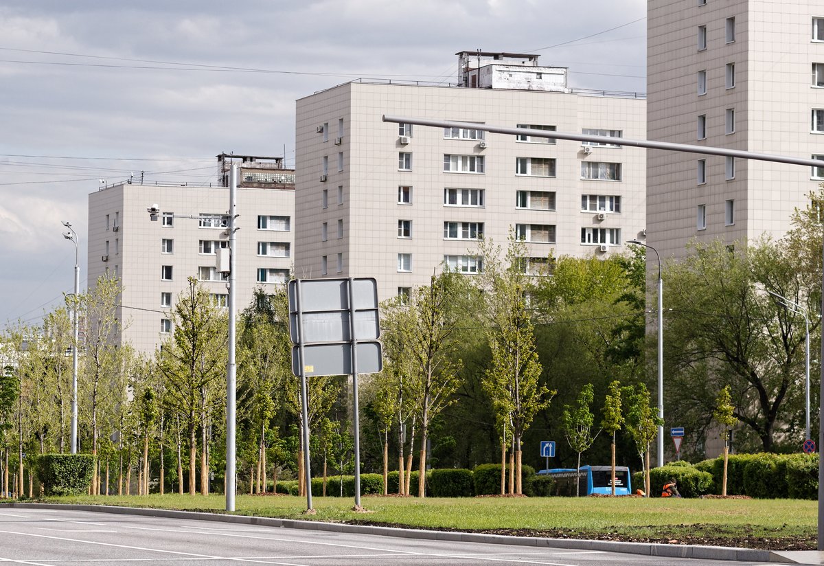 Nakhimovsky Prospekt in Moscow viewed from Sevastopolsky with buildings and a street on a sunny day