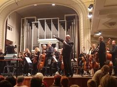 Interior of Lithuanian National Philharmonic with ornate architecture and a chandelier