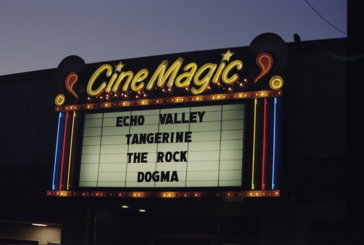 Cinemagic marquee glowing at night in Portland Oregon