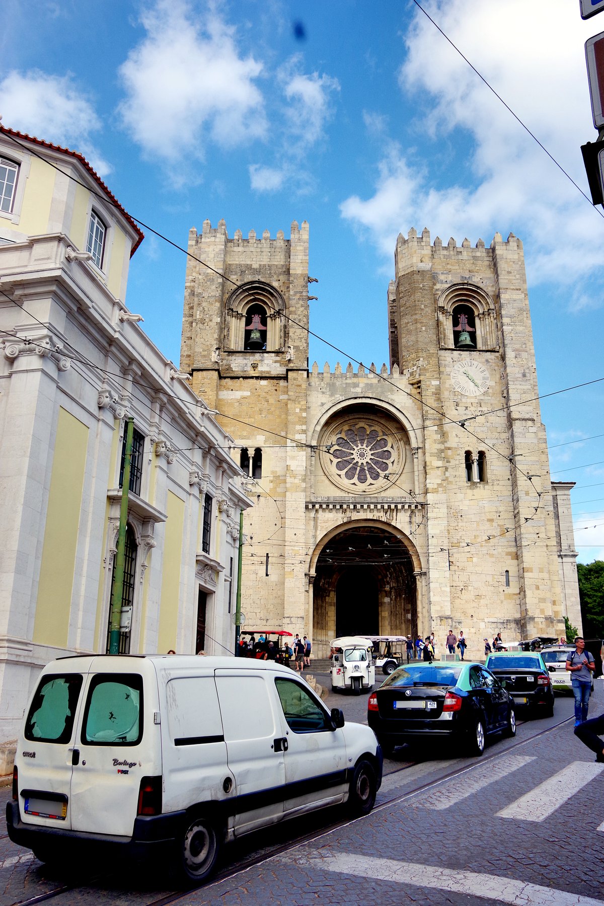 Facade of Lisbon Cathedral in Lisbon, Portugal with blue sky