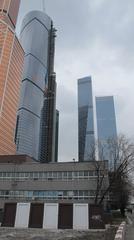 Skyline of Moscow International Business Center with modern skyscrapers under a partly cloudy sky