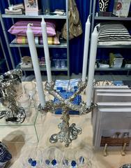 Modern drip candle holder with 4 arms made of aluminium
