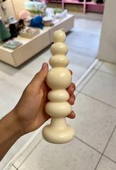 Knubby white candle made from 50% soy and 50% beeswax with a cotton wick