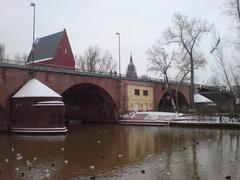 Alte Brücke bridge in Frankfurt with rowing club building and Neuer Portikus art gallery in background