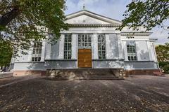 Helsinki Old Church in autumn with colorful foliage and historic architecture