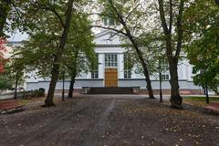 Old Church in Helsinki surrounded by trees during autumn